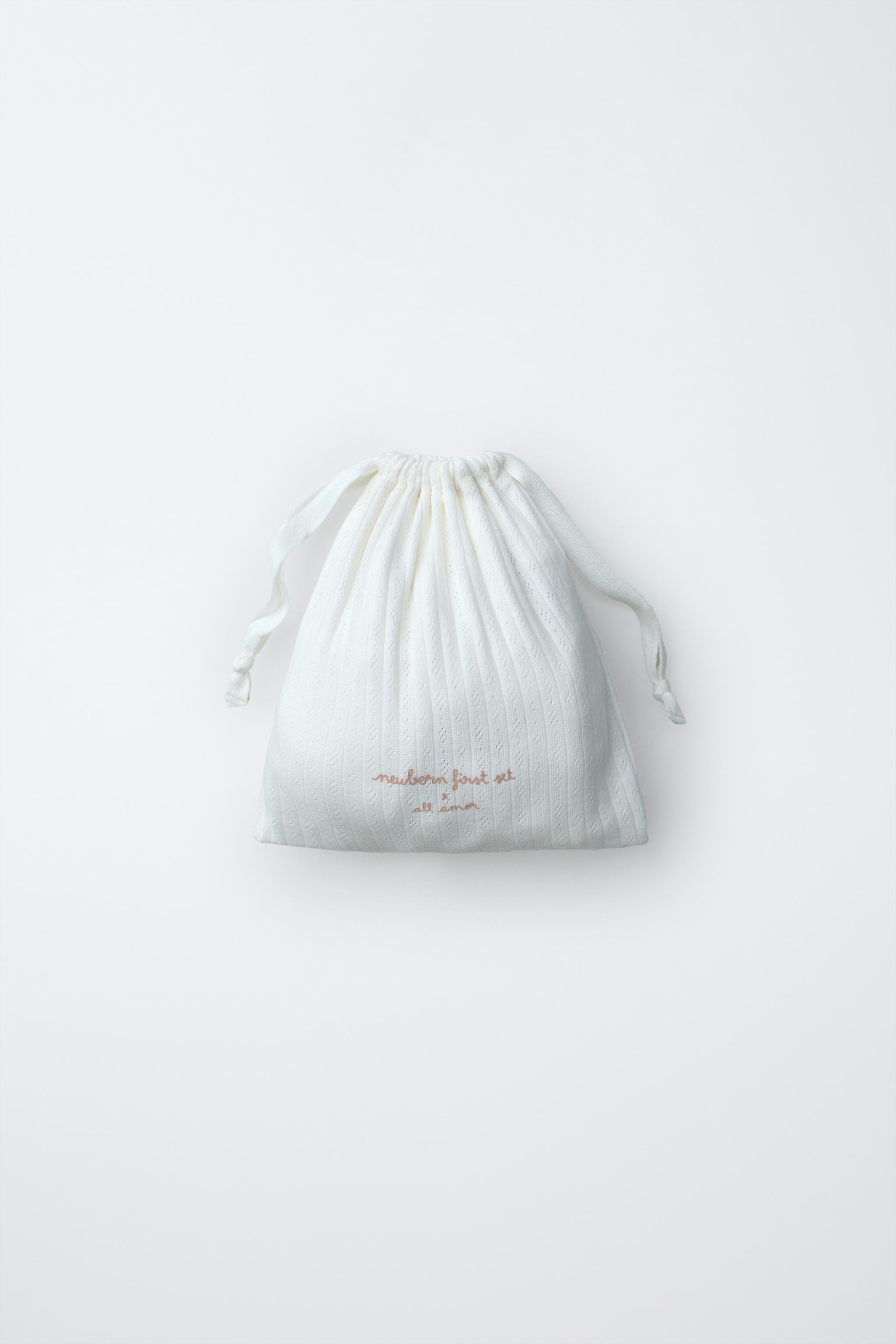 NEWBORN SET AND POUCH